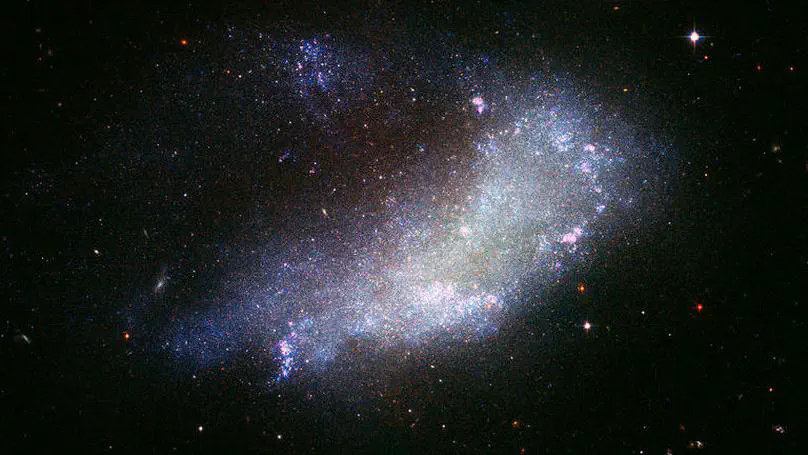 Investigating Star-forming Complexes in a Nearby Dwarf Irregular Galaxy