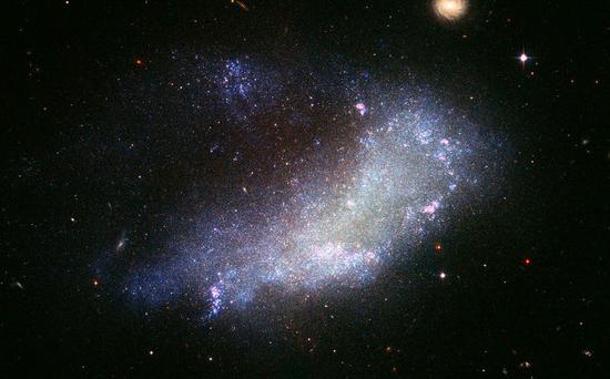Investigating Star-forming Complexes in a Nearby Dwarf Irregular Galaxy